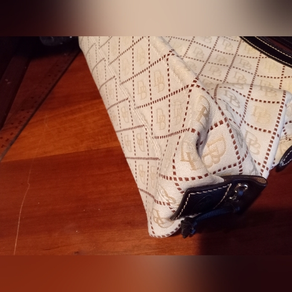Dooney and Bourke East West Slouch canvas signature fabric. Cream and brown. - Picture 13 of 16